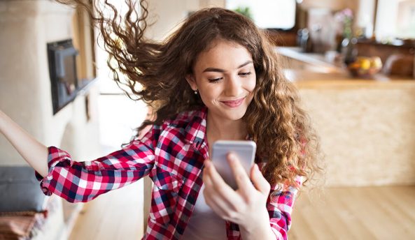 Young woman taking a selfie on her phon