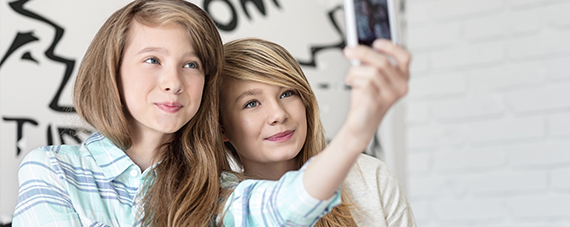 Two Young Women taking a selfie together.