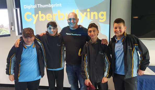 350000-post-593x343 Digital Thumbprint Program facilitator with students at Mount Ridley P-12 College in Victoria.