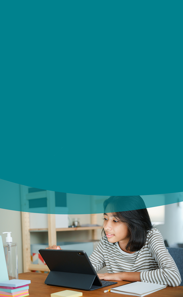 cyber-security-640x980 Young girl smiling at what she is watching on her iPad