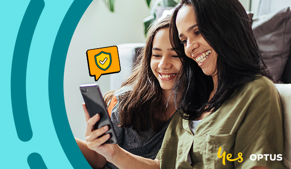 Two young women looking at a phone